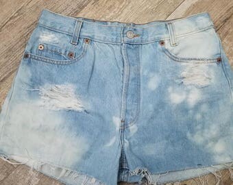 High waisted Bleached distressed Levi shorts.