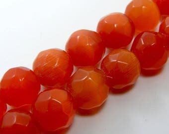 Set of 4 10 mm faceted cat's eye glass beads orange