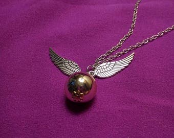 Harry Potter inspired Golden Snitch Necklace.