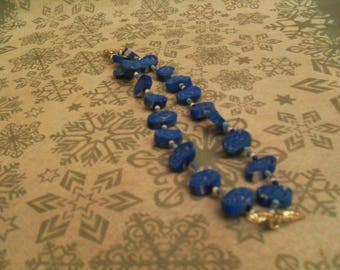 pretty bracelet made of beads and polymer clay blue and white