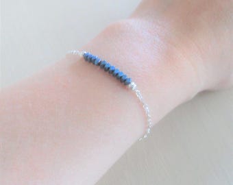 Minimalist 925 sterling silver chain/metallic-blue hematite bracelet.