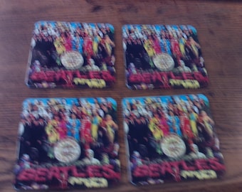 set of 4 brand new Sgt. Pepper's Lonely Hearts Club Band drink coasters