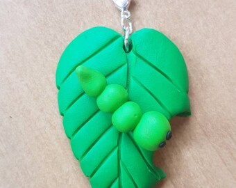Little polymer clay leaves with a hungry caterpillar
