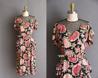 Gorgeous vintage 1940s black and pink floral print rayon dress with a sheer cutout neckline