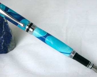 Blue fountain pen in swirling acrylic with bright chrome setting, handcrafted pen with blue swirls and high gloss