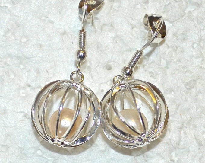 Pearls in a Cage, 7mm Round, not Drilled, Natural, Set in a Silver Plated Cage E1087