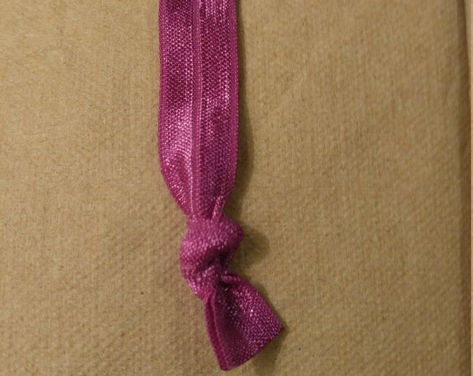 Purple hair tie