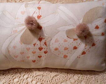Small pillow, baby booties