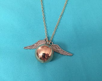Golden snitch necklace