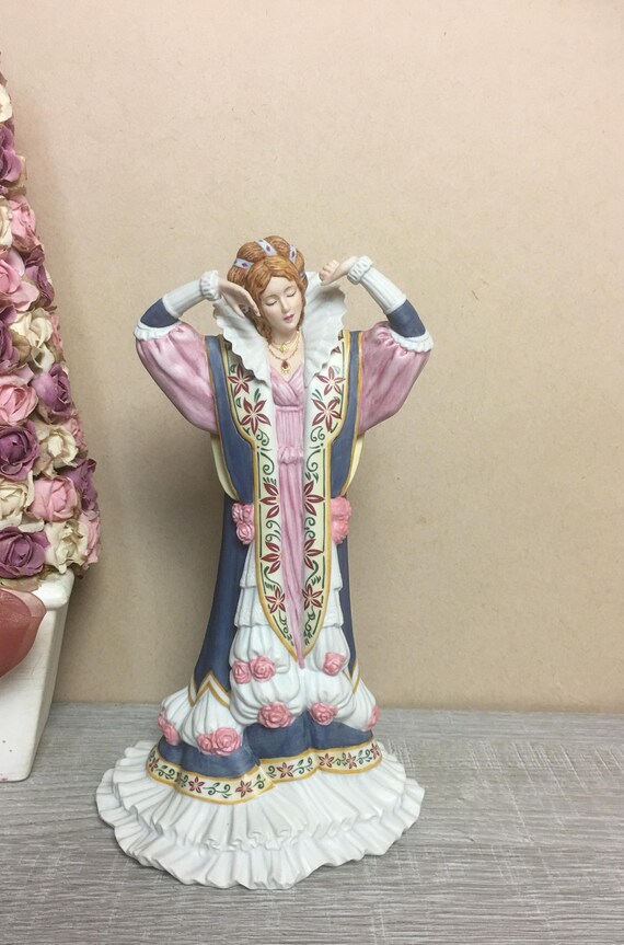 sleeping beauty porcelain figurines