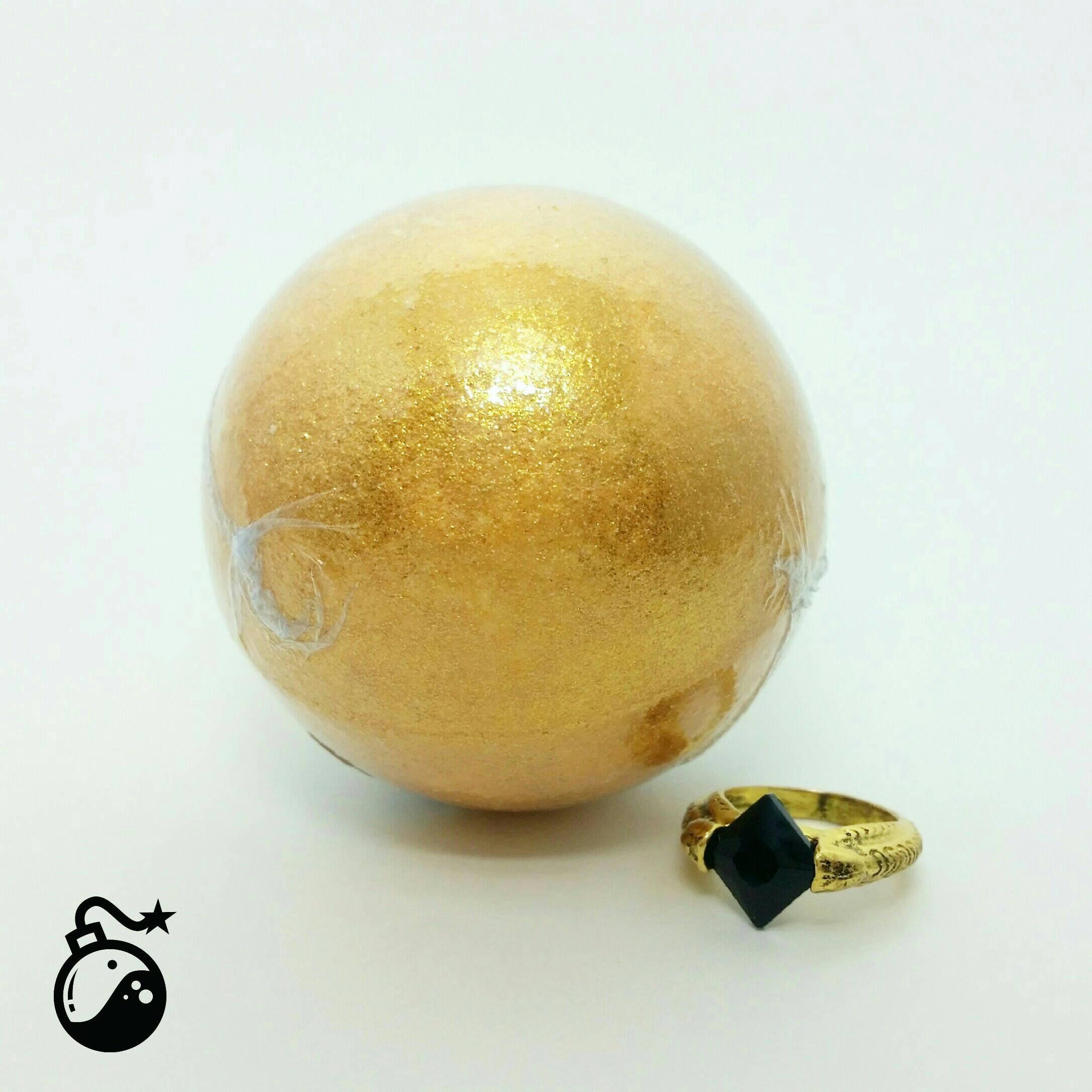 The Golden Snitch Bath Bomb With Resurrection Stone Ring