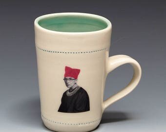 RBG with pussy hat mug