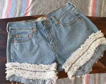 515 Levi Cut Off Jean Shorts with lace embellishment, fray