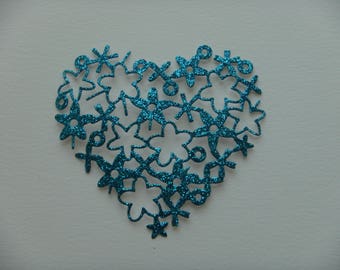 Heart shaped cutout flowers blue glitter