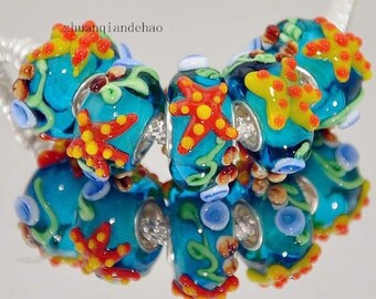 1 x glass bead - Blue Bead with a starfish.