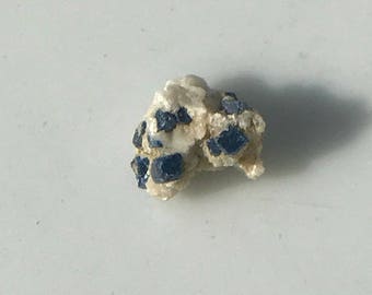 Rare cluster of 10 Boleites on white crystal matrix from Baja California, Mexico