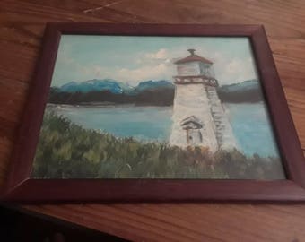 Painting of a Lighthouse in a Frame