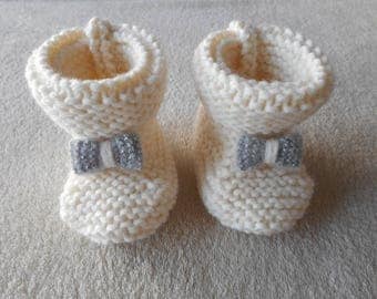 Ecru wool baby booties and Silver Bow