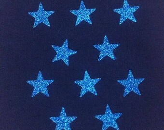 10 little stars clothing blue glittery 15x15mm
