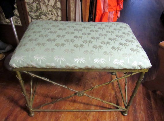 Metal upholstered bench with palm tree fabric cushion