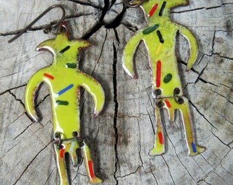 green torch-fired enamel petroglyph warriors
