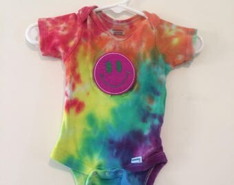 Gerber's 3-6mos tie dye onesie rainbow splatter with raspberry smiley face