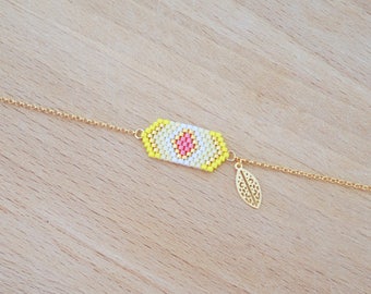 Geometric bracelet weaving yellow diamond and gold plated feather