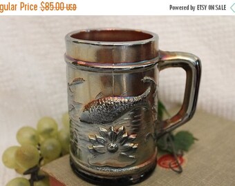 SALE Antique Dugan Glass 4" Amethyst Carnival Mug - Fish in Pond, Fisherman, Trout with Cattails and Flower