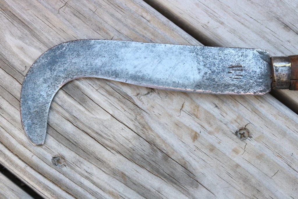 Vintage billhook from AppalachianAxeworks on Etsy Studio