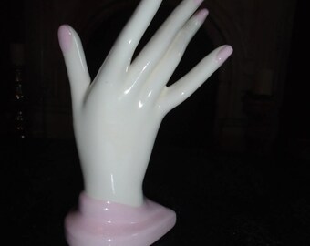 Porcelain hand ring holder pink nail polish