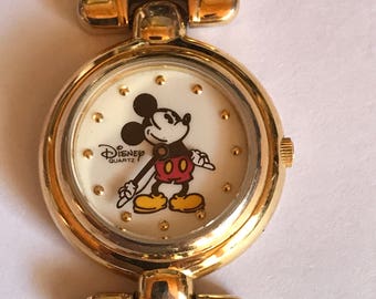 Disney Mickey Mouse watch with gold band 7.5" Long