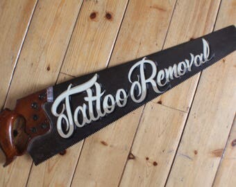 pain free tattoo removal rusty saw sign plaque barbers shop pain free tattoo removal rusty saw sign plaque barbers shop