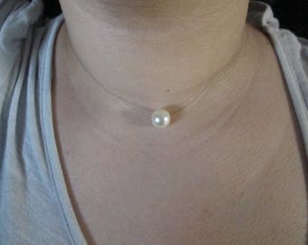 Crew neck line clear hair adorned with ivory beads