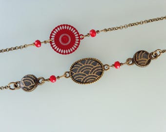 Asymmetrical necklace in dark Golden wave gray Japanese paper.