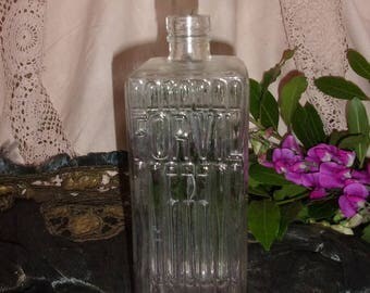 A great old FORVIL thick molded glass bottle