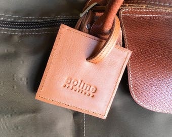 Leather luggage name * black