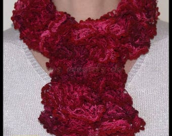 Raspberry and Burgundy ruffled scarf is knitted