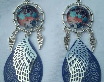 Get dreamy blue flower and wings earrings