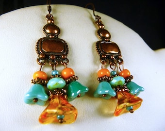 Earrings in copper and orange and turquoise beads