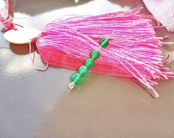 green transparent 6 x 10 mm round jade bead