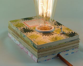Book lamp "Tartarin in the Alps"