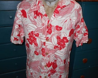 white hawaiian shirt with red flowers