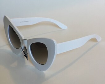 Thick white cat eye sunglasses