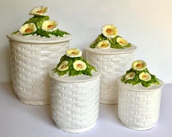 1960s Lefton Ceramic Canisters #4115. Set of 4 White Basketweave Texture. Cylindrical Canisters with Daisies. Yellow, White Green.