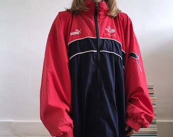 Vintage Puma windbreaker jacket. Men's size XL. 90's era.
