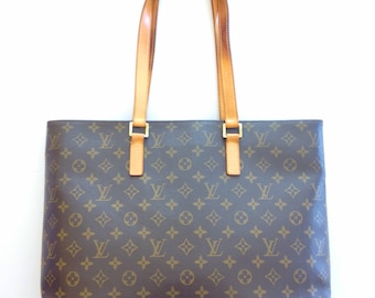 Gorgeous!!! Authentic Preowned LOUIS VUITTON Classic Monogram Luco Large Tote Bag. Great condition with some minor defect on strap.