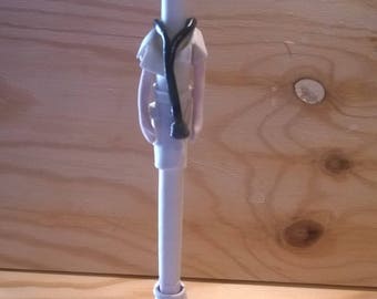 A pen with a lovely top nurse figurine made of porcelain