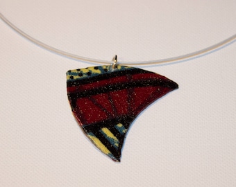 Pendant in Burgundy and black African fabric