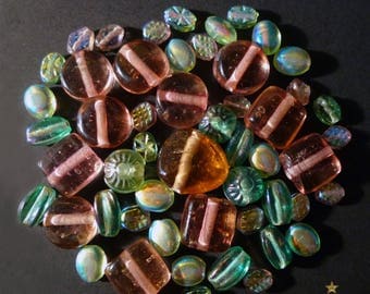 52 Indian pink, green of various shapes glass beads