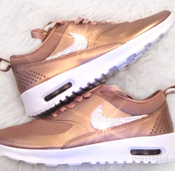 black nike with rose gold swoosh